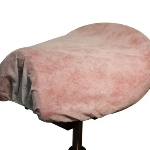 Sitzabdeckung Bambach® in weißer Farbe auf einem Stuhl montiert.