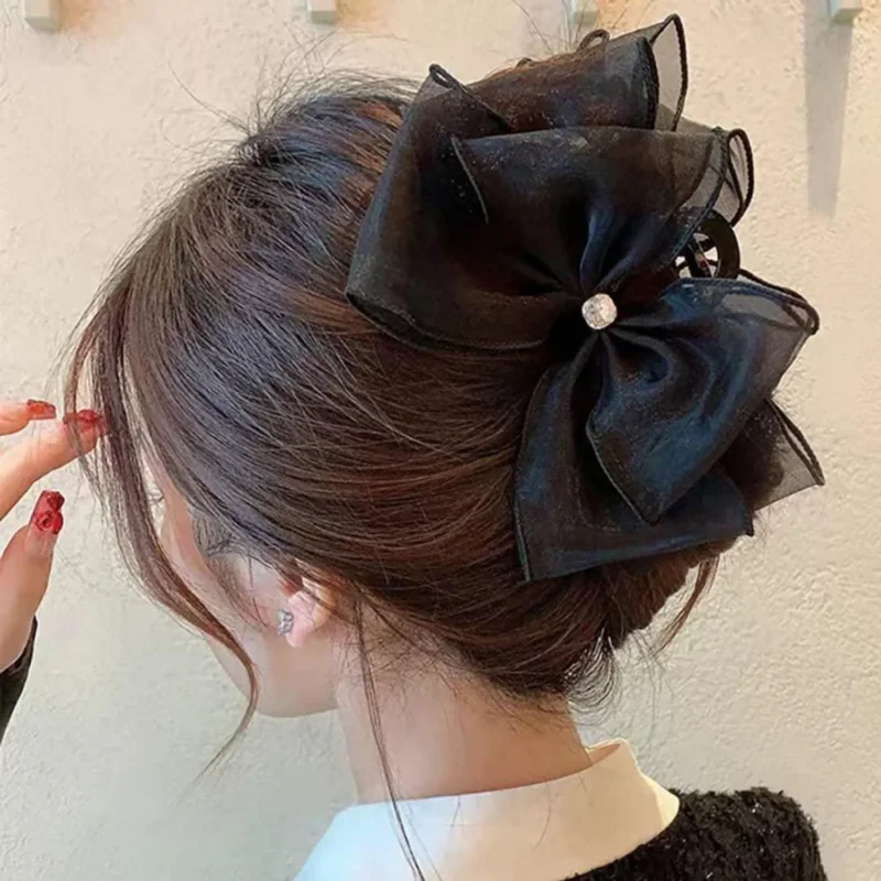 Schwarze Tüllschleife Haarklammer mit Strasssteinen